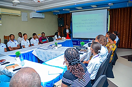 Participants in a BENEVO boardroom-style workshop